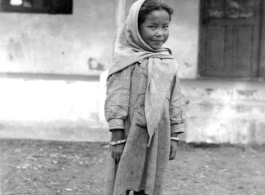 Cute girl in Burma, during WWII.