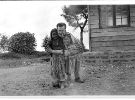 GIs posing with cute kids in Burma, during WWII.