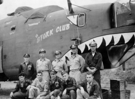 The B-24 bomber "Stork Club" crew posing for a picture.  Harry Nutter Russell is kneeling second from the left. He disappeared when he bailed out of "Stork Club," and presumably drowned in Lake Dian (Kunming Lake). (Thanks L. Silverman for the extra info!)