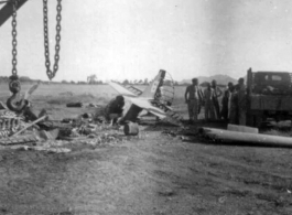 Burned American fighter, a P-51 or P-40, in Guangxi, China.