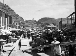 A crowded street in Liuzhou in 1945, during WWII. This should be south of the river.