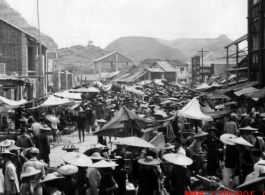 A crowded street in Liuzhou in 1945, during WWII. This should be south of the river.