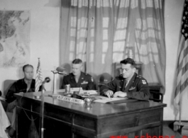 Chennault holds staff meeting on November 2, 1944, in China, during WWII.