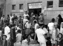 This is the Liuzhou city (Guangxi province) railway station during the evacuation as the Japanese advanced on the city in the fall of 1944. Notice that the picture quality is high enought to read the advertisements, slogans, and messages, left on the wall behind the crowd