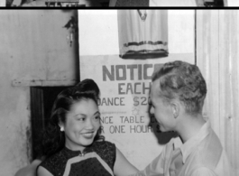 A beautiful taxi-dancer keeps a GI company at a ticket-a-dance site in China during WWII.