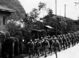 Chinese troops marching, probably at Liuzhou, Guangxi. During WWII.