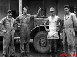 Nash (far left) and Nick Arico (third from left) and others, and the snake, at Luichow, Oct 1944.