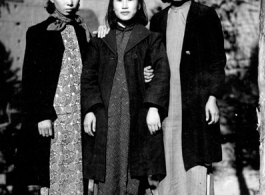 Woman in Yunnan, China, likely wives of officers. During WWII.