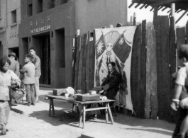 Scenes around Kunming city, Yunnan province, China, during WWII: A street side stall.