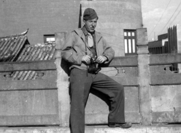 GI combat photographer out seeing the sights, almost certainly in Kunming, Yunnan province. During WWII.