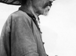 An elderly man in China during WWII.