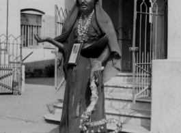 A blind beggar in Calcutta, India, during WWII.  Photo from O. P. Noel.