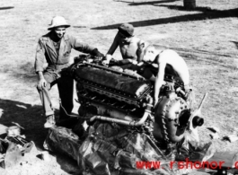 Engineers unwrap and prep a new engine in the CBI during WWII.