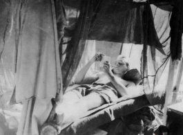 Photos taken by Robert F. Riese in or around Liuzhou city, Guangxi province, China, in 1945.  Robert Riese in his barracks bunk at Liuzhou during WWII.