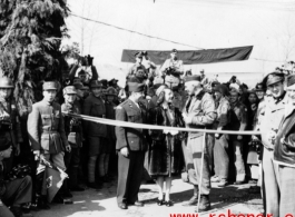 American and Chinese VIPs cut tape on the Burma Road during WWII.