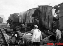 Allied gas train at the edge of the field, Liuzhou (Luichow), China Sept 1944, after a Japanese bombing raid, during WWII.