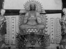 A Buddhist statue in China during WWII.