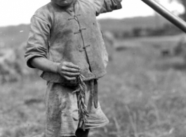 A close-up of the boy in the paddy at the foot of our area, Yangkai, China 1944.