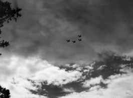B-25 Mitchell bombers in flight in the CBI near an American air base, in the area of southern China, Indochina, or Burma. During WWII.