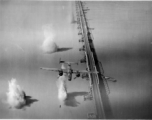 A B-25 on a bombing run over a bridge in the CBI.