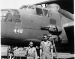 Chinese soldier and American engineer stand before the new 25, #448, Yangkai, May 1944.  Unknown, Frank Bates.