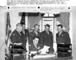 Tactical commanders of Maj. Gen. C. L. Chennault meet in observance of 14th Air Force Second Anniversary. Left to right: Brig. Gen. Russell E. Randall, Brig. Gen. Winslow C. Morse, Col. Clayton B. Claussen, and Brig. Gen Albert F. Hegenberger.