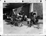 Chinese ground crews clean 50 cal. machine guns during WWII. Left to right: Sgts. Huang Wan-yi, Liu Hantao, and Toeng Tac-Han