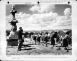 Men of the 14th Air Force and Chinese civilians honor war dead during Memorial Day service in China. 1944