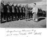 American officer, with his translator, inspecting Chinese unit and being welcomed warmly near Mitu, in 1944, in the CBI during WWII.  Official photo of U. S. Army Signal Corps