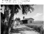 "A village scene somewhere in China, October 1943." Almost certainly Yunnan, China. From Milton J. Seibert.