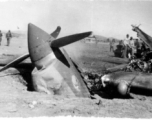 A P-40 of the 26th Fighter Squadron, with a "China Blitzers" badge on cowling (thanks jbarbaud!), attached to the 51st Fighter Group. In China during WWII.