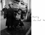 Kids on the street in Nanjing during WWII, January 2nd, 1946.