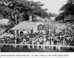 Crowd milling around at Dacca horse races during WWII.  Photo from John Boudurant.