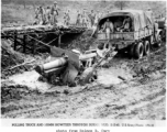 Pulling truck and 155mm Howitzer through mud on Burma Road, February 15, 1945.   US Army Photo.  Image from Raimon B. Cary.