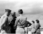 Chennault talks with officers in the CBI during WWII.