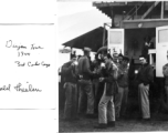 GIs enjoy refreshments---handed out by a female Red Cross service worker---at a truck parked at the Dinjan air base control tower (62nd AACS), in 1944. 3rd Combat Cargo.  Donald Thielen, Crowley, Stephanson, Henry, Gallione, Carrolson, Snyder.  Photo from Donald Thielen.