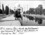GI E. Gartly Jaco tests the depth of the water at the Taj Mahal in 1945.