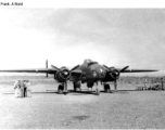 The "Skull & Wings" insignia on plane's side near the nose indicates this parked B-25J Mitchell is assigned to 490th Bomb Squadron, 341st Bomb Group.  The 490th had stayed in India, attached to Tenth Air Force, when 341st BG moved from to China in January 1944. With aerial combat finished in Burma, the 490th BS (attached to 312 Fighter Wing) moved in late April 1945 to Hanzhong (Han-chung), southwestern Shaanxi sheng (province), central China.  Images from Frank A. Bond.  (Additional information courtesy of