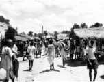 A market in India (or Burma) on a hot day during WWII.