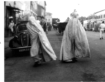 Women in full-body covering in Karachi, India, during WWII.  In the CBI during WWII.  Photo from Walter De Blair.