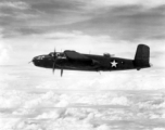 Photograph of B-25C in flight in the CBI, tail number 130367 (serial number 41-30367). Notice the machine gun (.50 cal.) barrel sticking out of the belly of '367.'  This 491st Bomb Squadron aircraft was damaged by flak on 20 Dec 1943 and the crew bailed out. 2nd Lt. Charles H. Redd, navigator, became a POW. He survived and returned to the USA in Sep/Oct 1945.