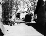 Local people in China whiling the time in a village corner.  From the collection of Eugene T. Wozniak.