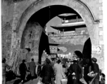 A busy town gate in Yunnan province, China, during WWII.  From the collection of Eugene T. Wozniak.