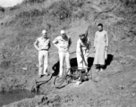 American and Chinese personnel pumping water near an American base, China, during WWII.  From the collection of Wozniak, combat photographer for the 491st Bomb Squadron, in the CBI.