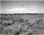 An American B-25 bomber flies at minimum altitude, probably during training/practice of 'low-level attack techniques', for 'skip bombing'. During WWII.