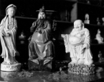 Porcelain statuettes in a shop in China. During WWII.