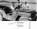 Major Wilfrid M. Cline, commander of 16th Combat Camera Unit from May 1943 to February 1945, at the driver's seat of a jeep at an American base in China during WWII. Two others unknown.