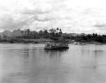 Retreating by ferry near Lingling in the face of the Japanese advance in the fall of 1944, crossing a river by ferry.