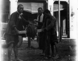 Putting down barbed wire in the fall of 1944 in Liuzhou. Notice the English "United Artist Studio" in the back--after the Japanese retreat from Liuzhou, only those pillars stood.