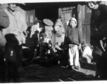 Three old men and a boy with new clothes, Yangkai Village, Spring 1945  From the collection of Frank Bates.